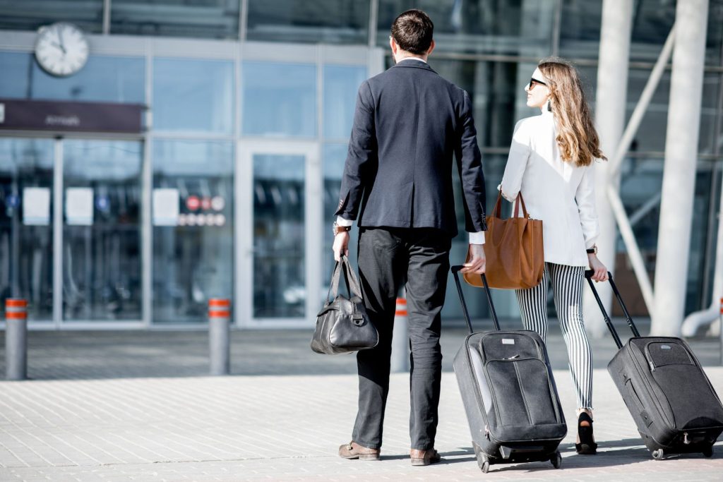 Two people on their way to the airport 